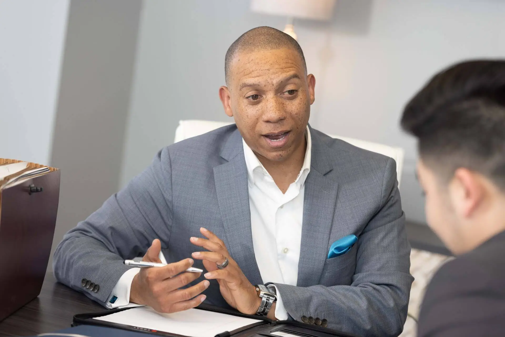 Jeremy A. Johnson, CPA discussing aggressive tax planning with client.